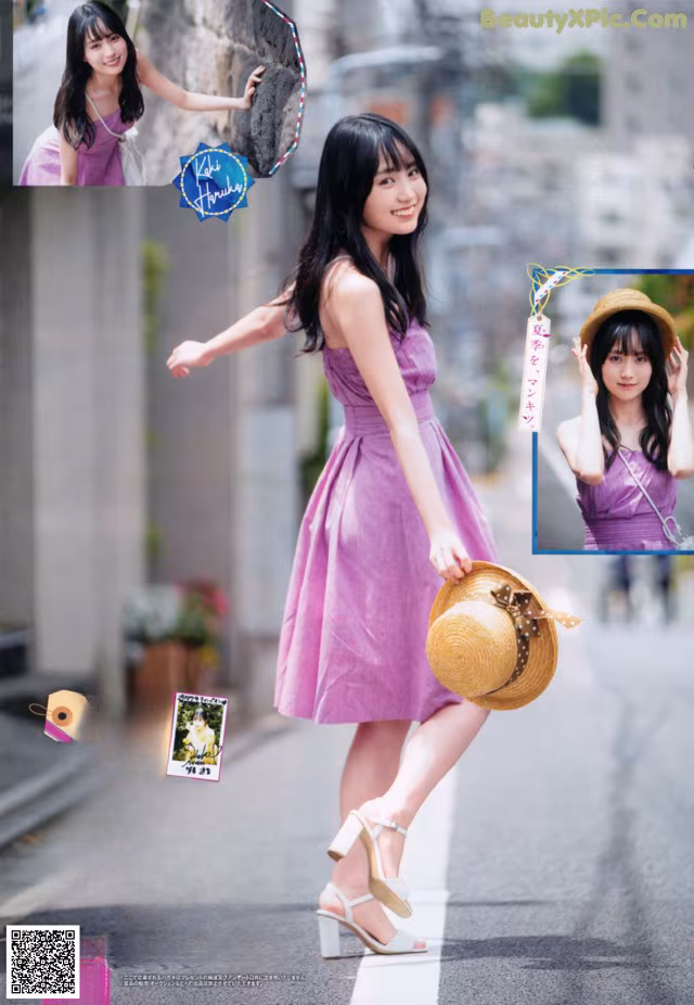 A woman in a purple dress and a straw hat.