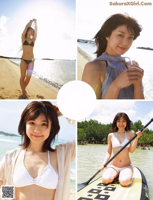 A woman in a bikini on a paddle board on the beach.